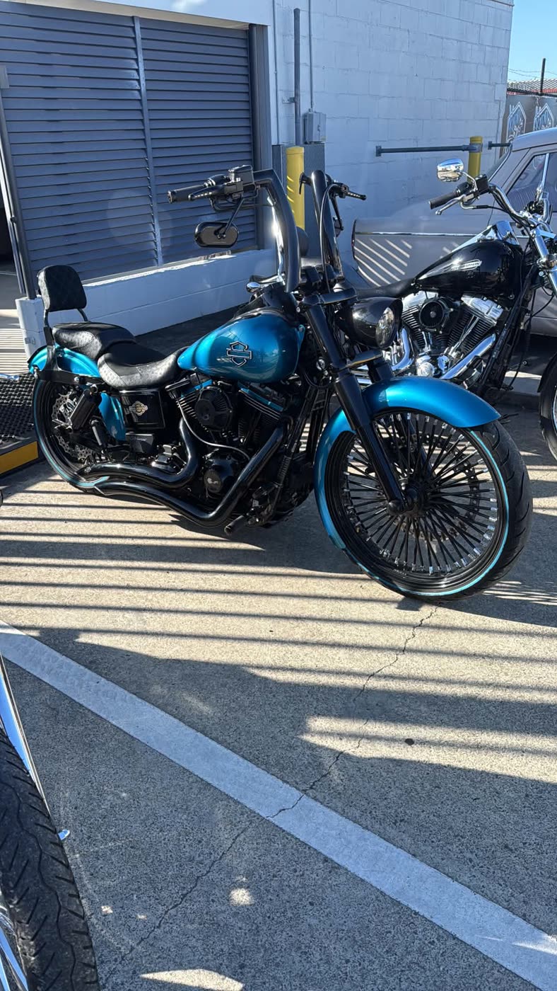 Blue Harley bagger
